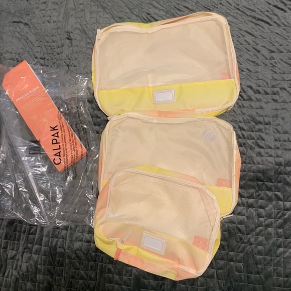 yellow calpak luggage